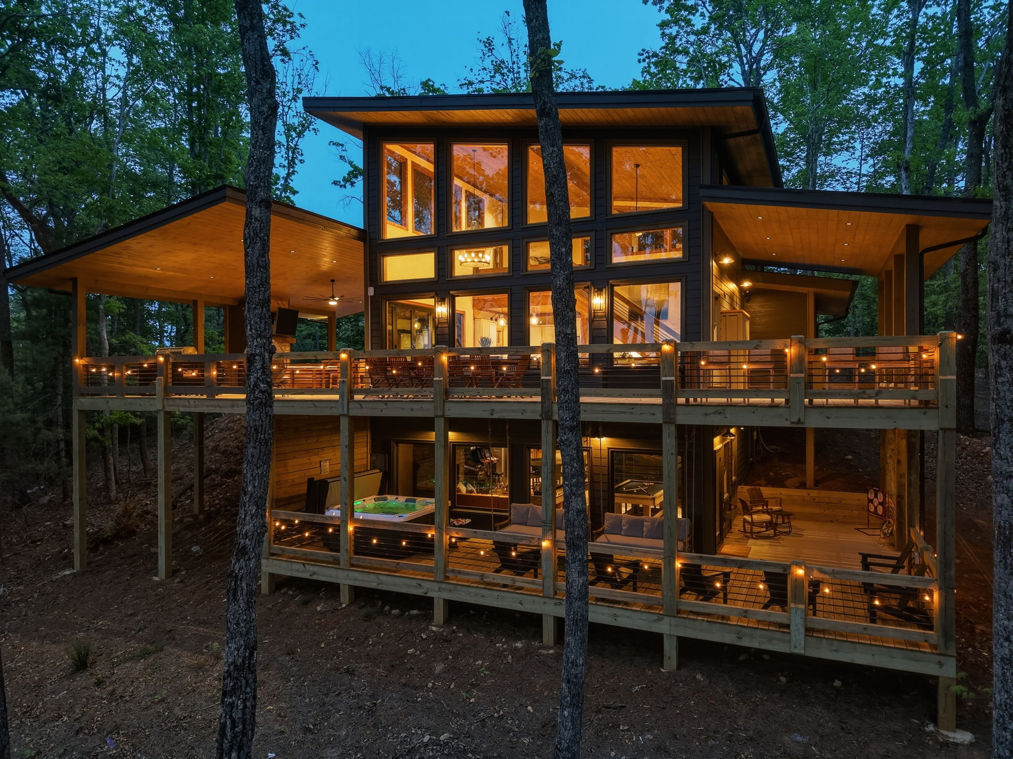 Exterior home lighting turned on to prepare for a professional twilight real estate photo shoot