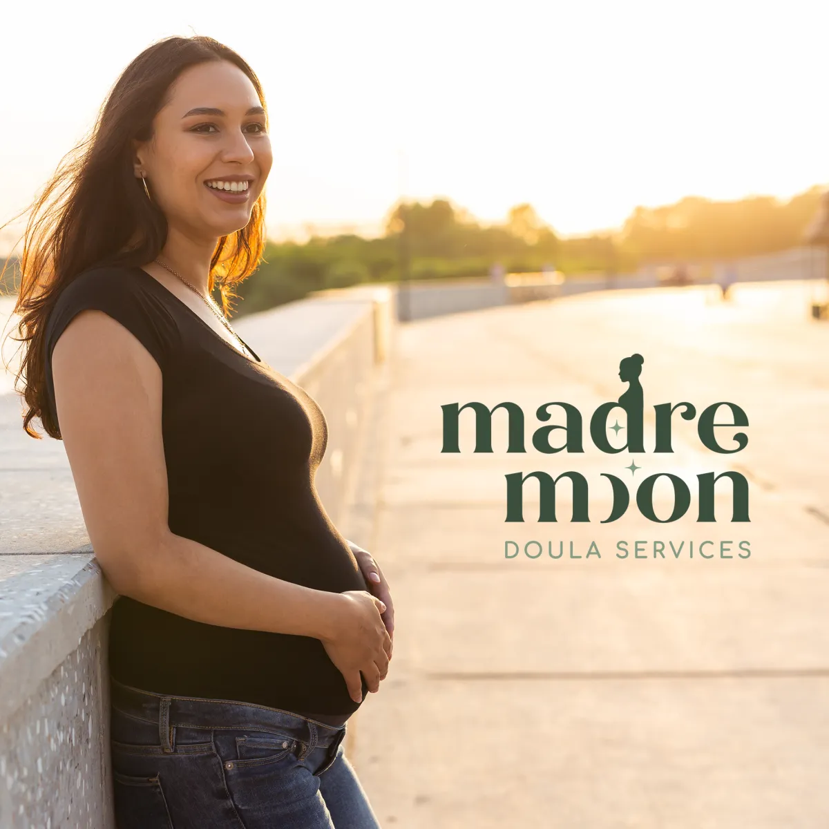 Smiling woman on rooftop at sunset