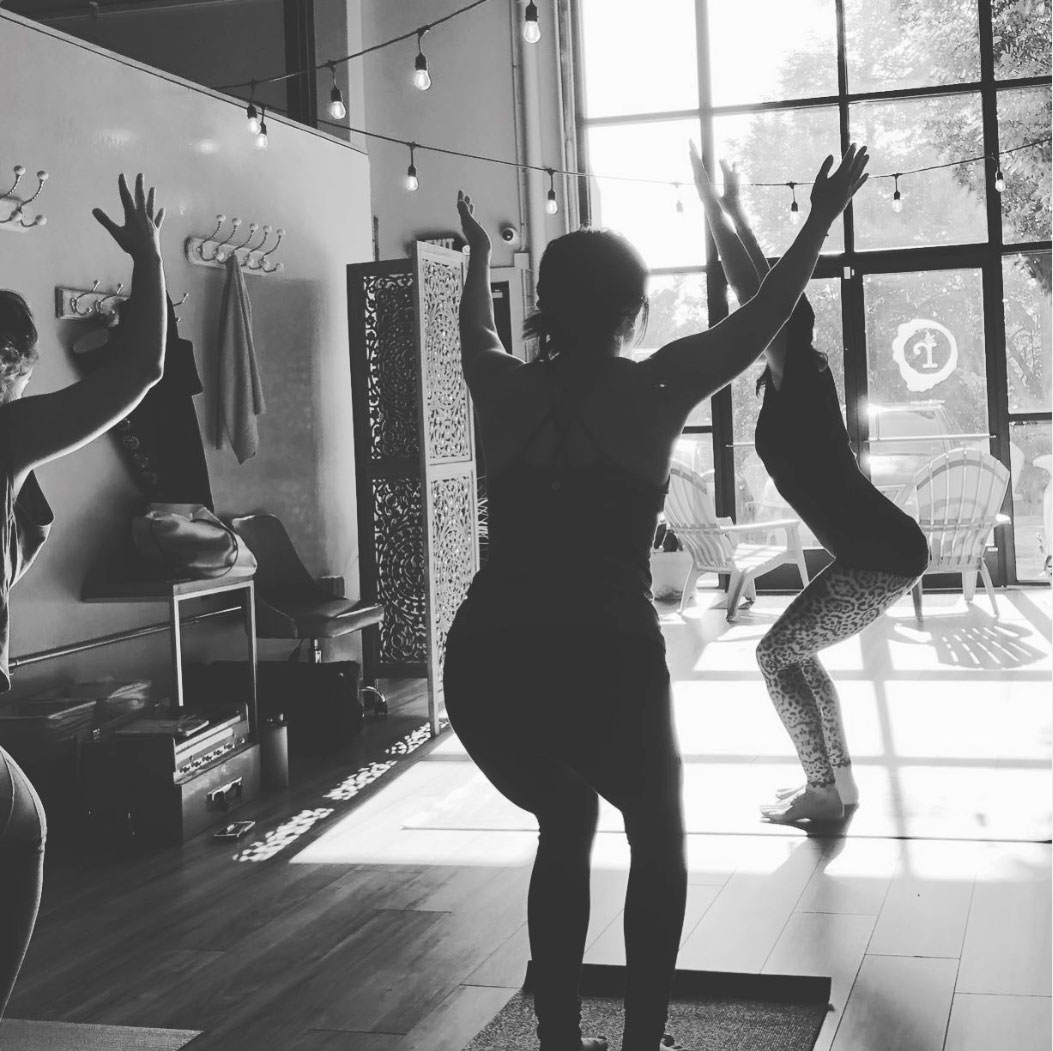 Members in tree pose