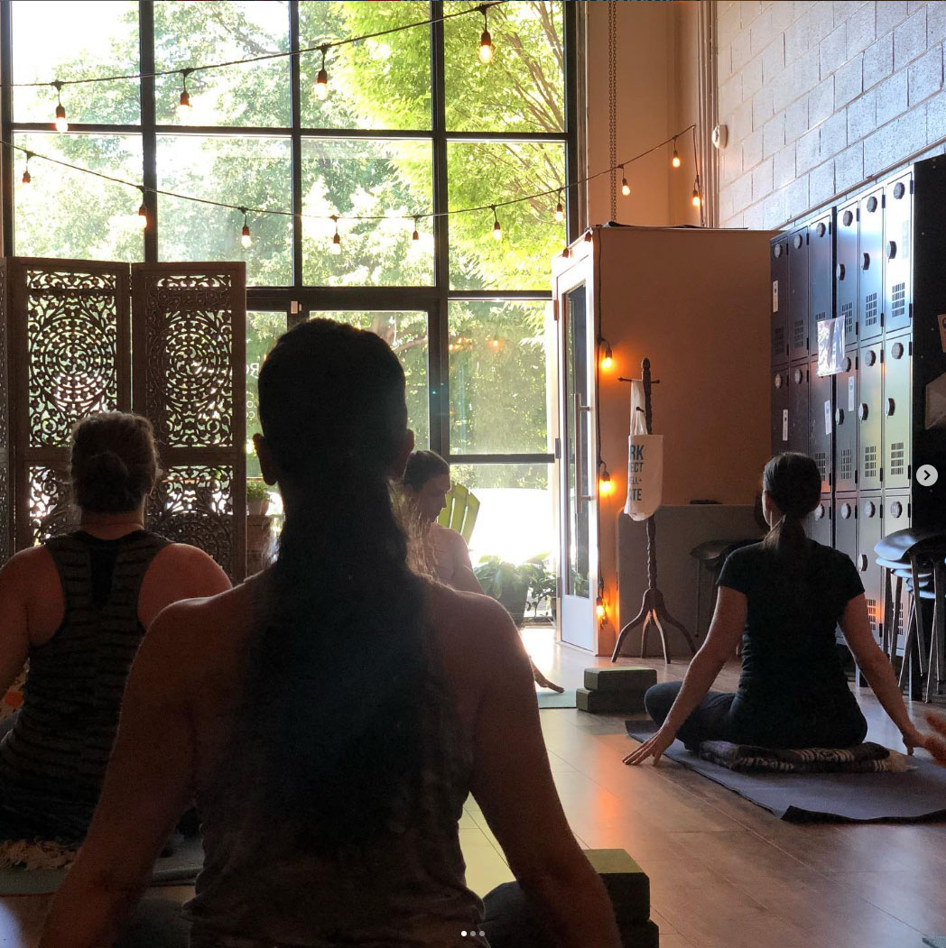 members doing yoga