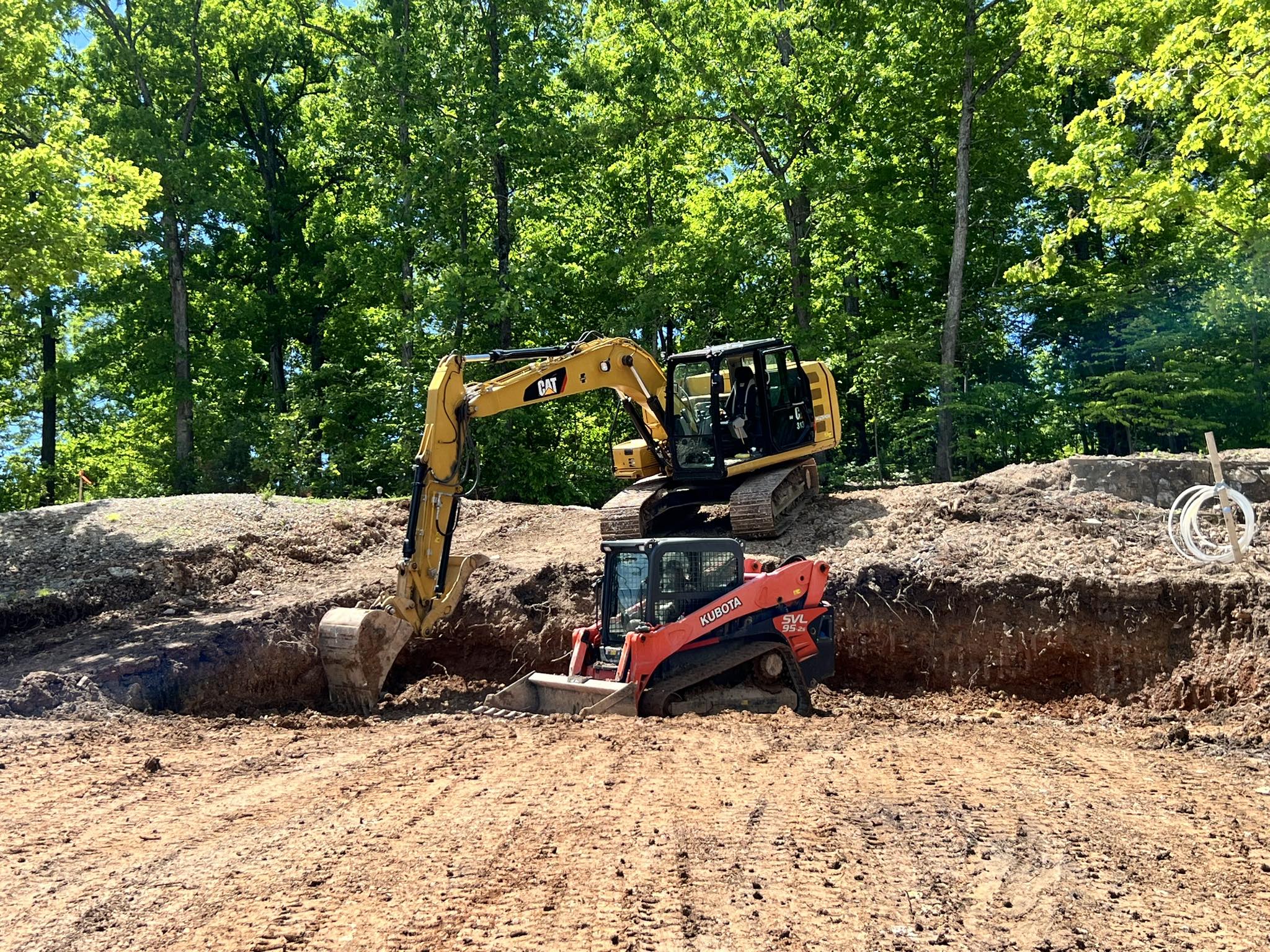 Excavator working on a residential property
