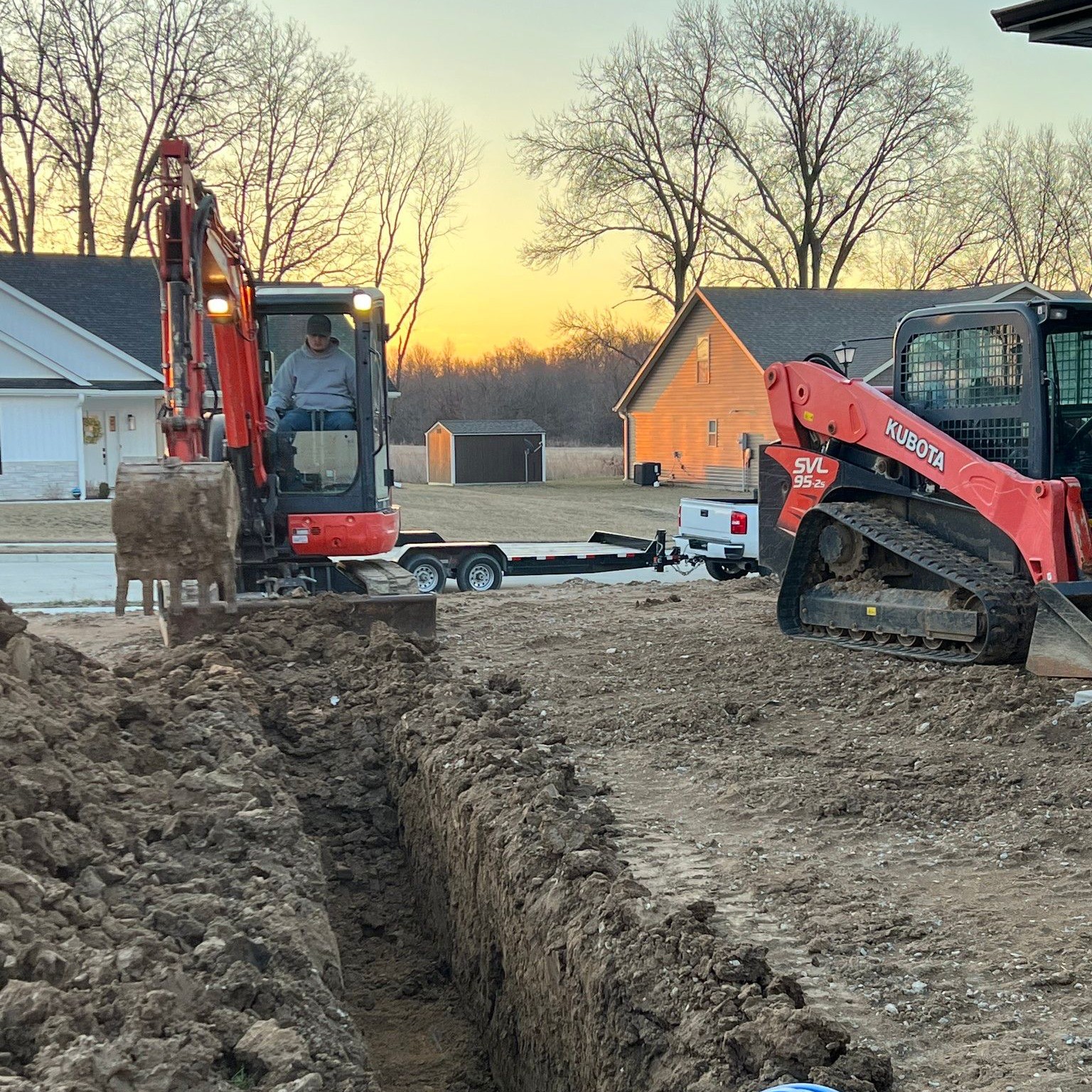 Yard drainage excavation with piping