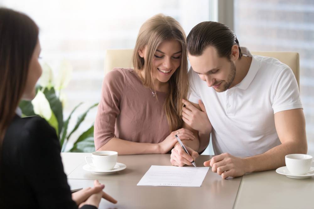 Bail bond agent helping with paperwork in Granville County NC
