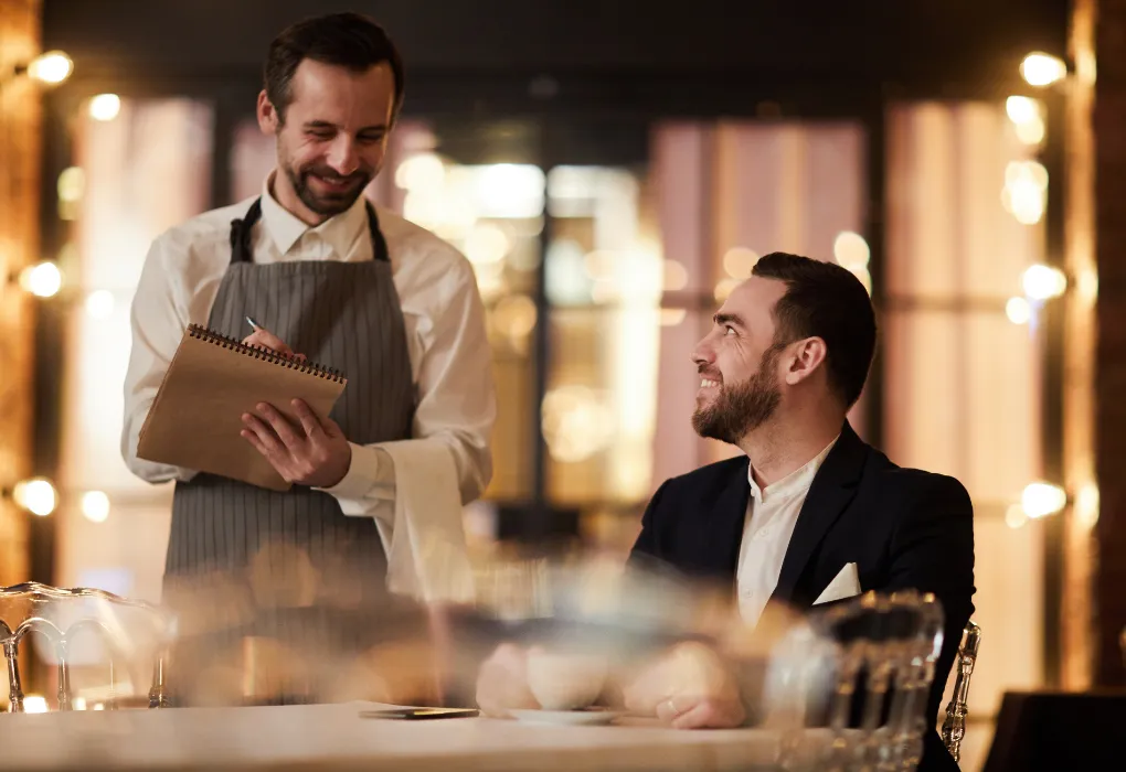 architectural photography of building with people in it during nighttime