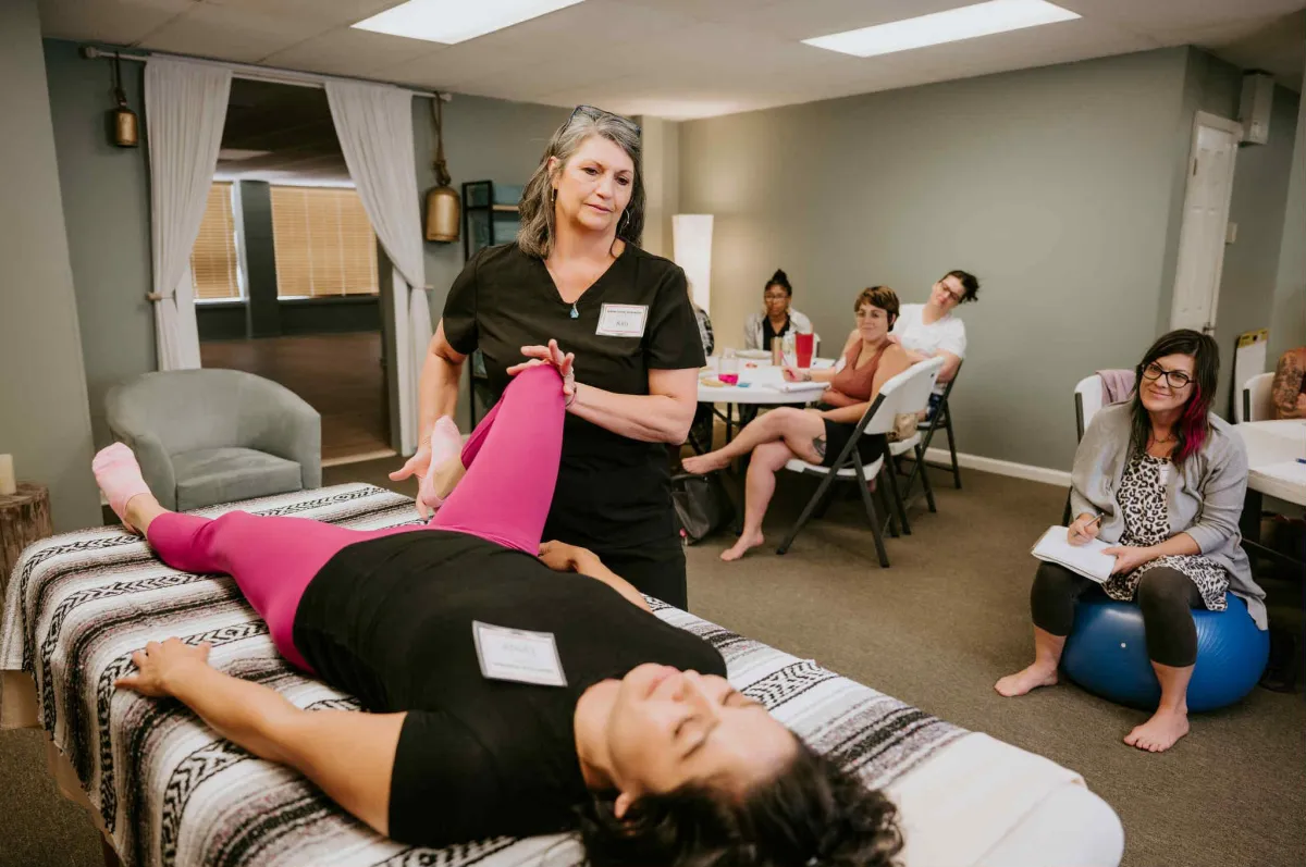 a person walking along a beach next to the ocean
