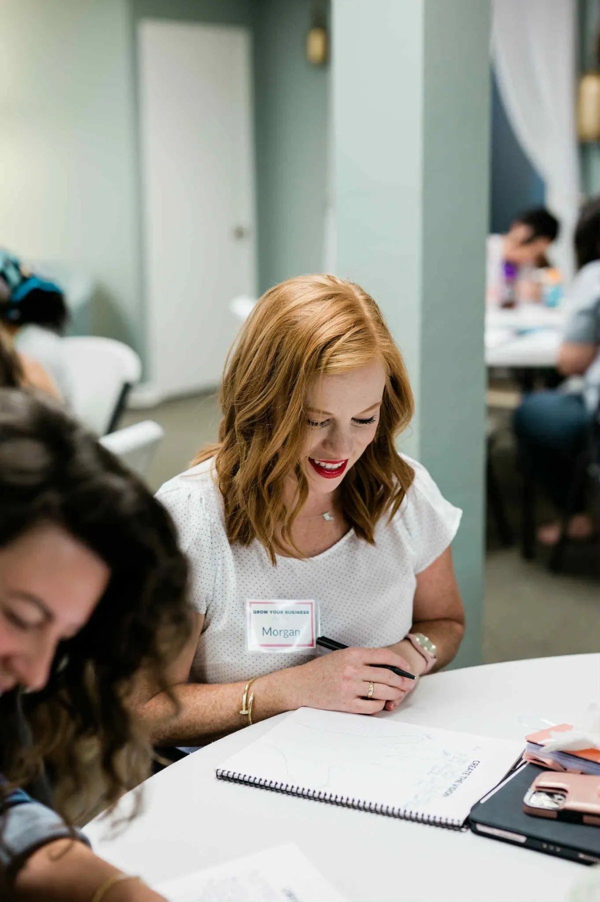 a person walking along a beach next to the ocean