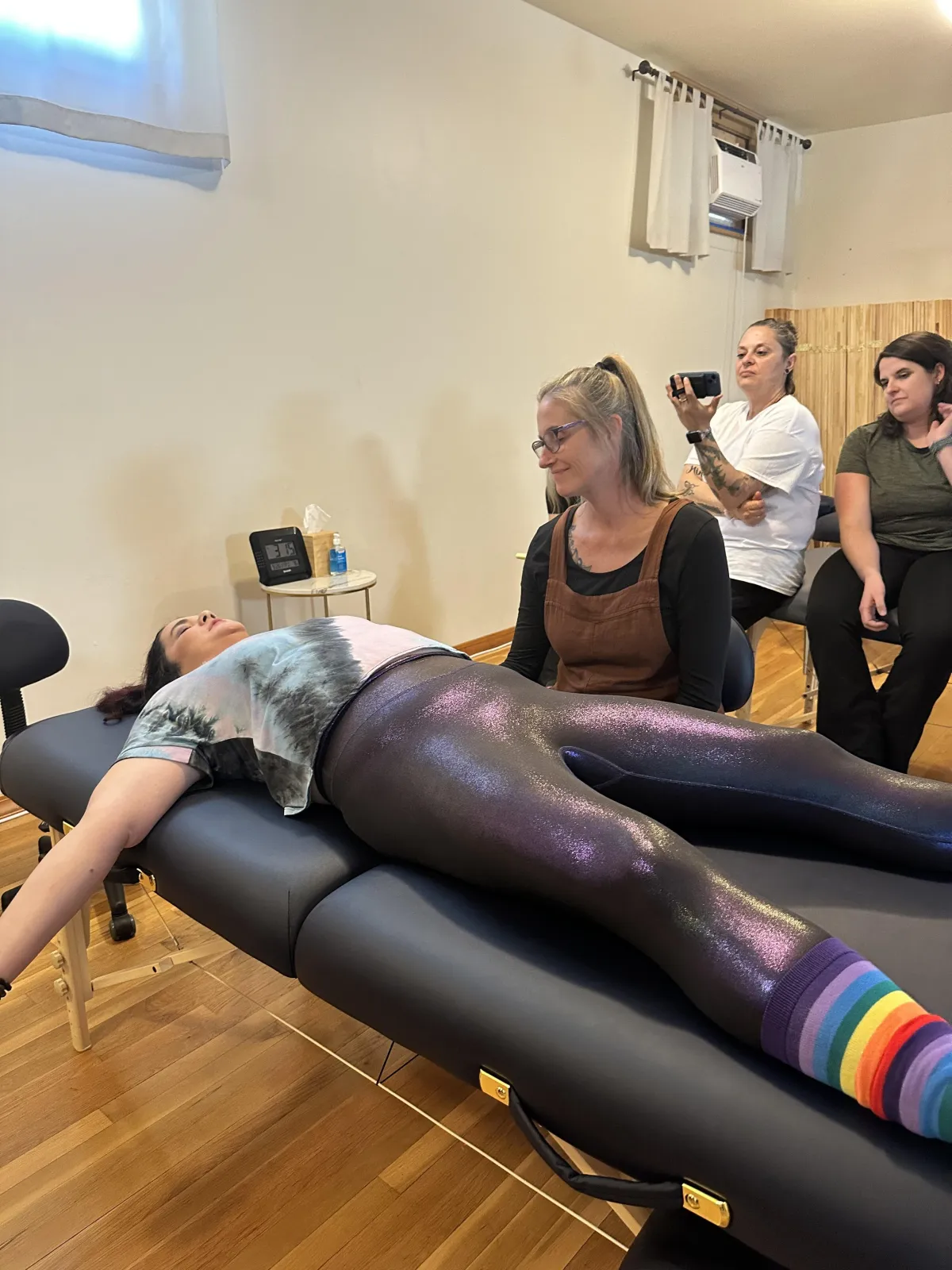 a person walking along a beach next to the ocean