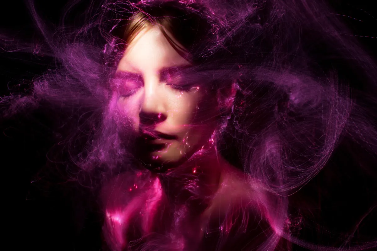 psychedelics a lady with magenta glowing lights