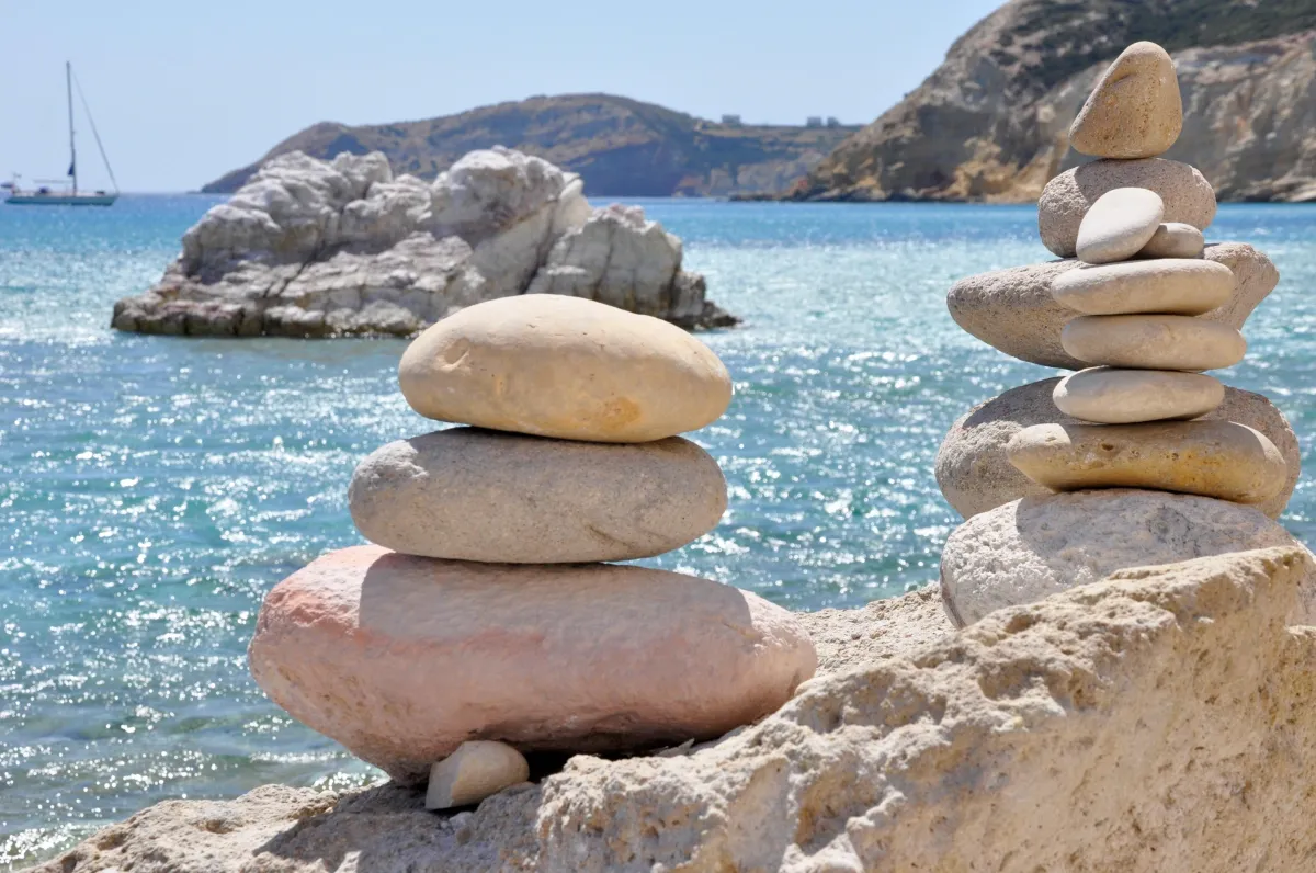 balanced stones peaceful sunny sea