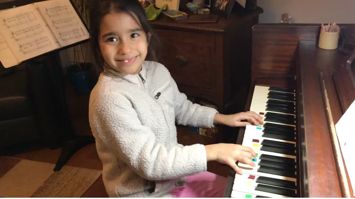 Child playing piano