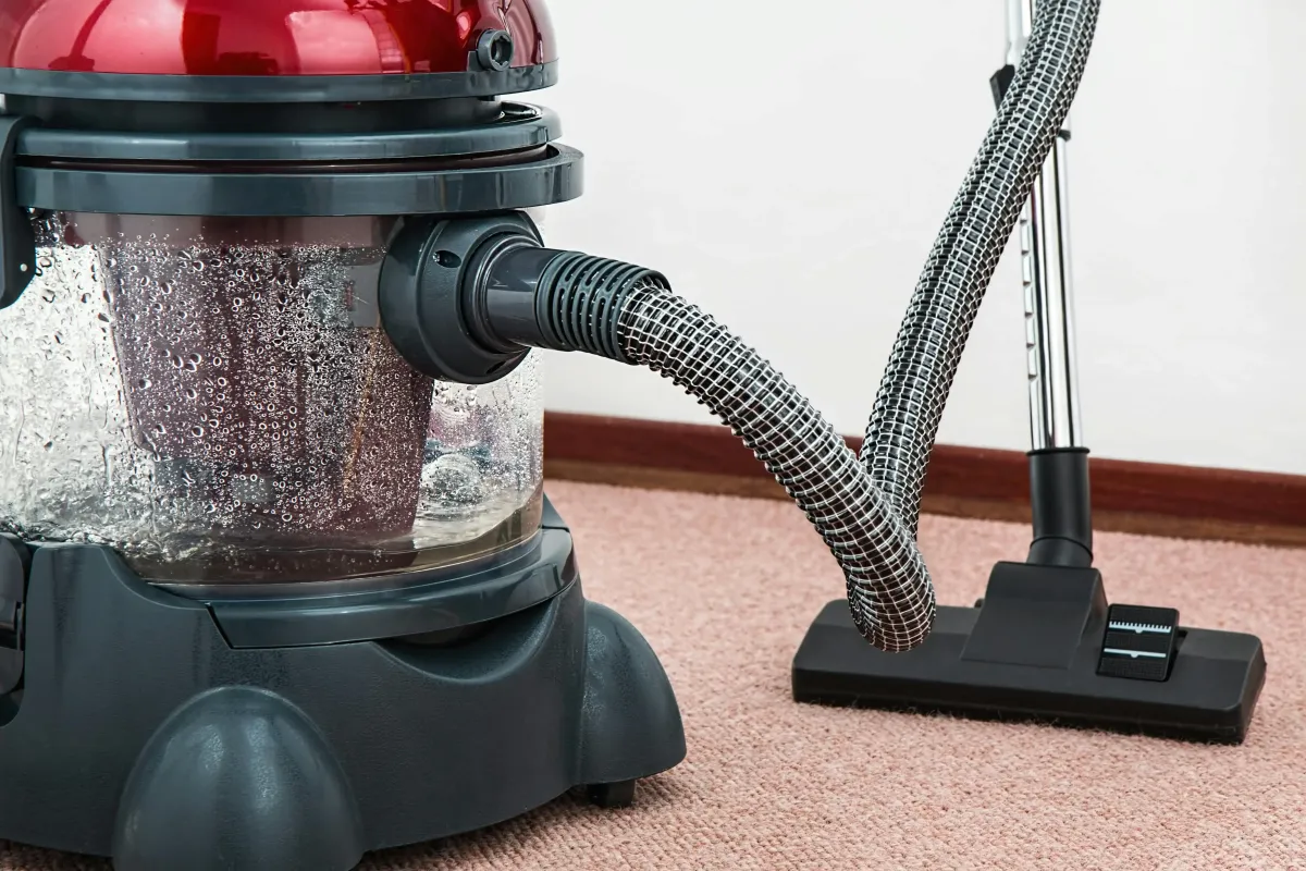 Professional commercial floor care service stripping and waxing floors in an office building