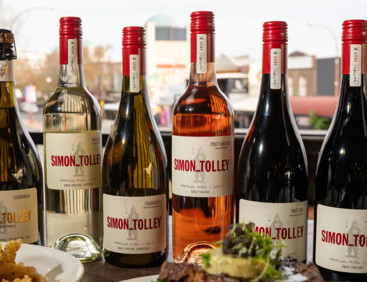 A sophisticated guided wine pouring at a dining table