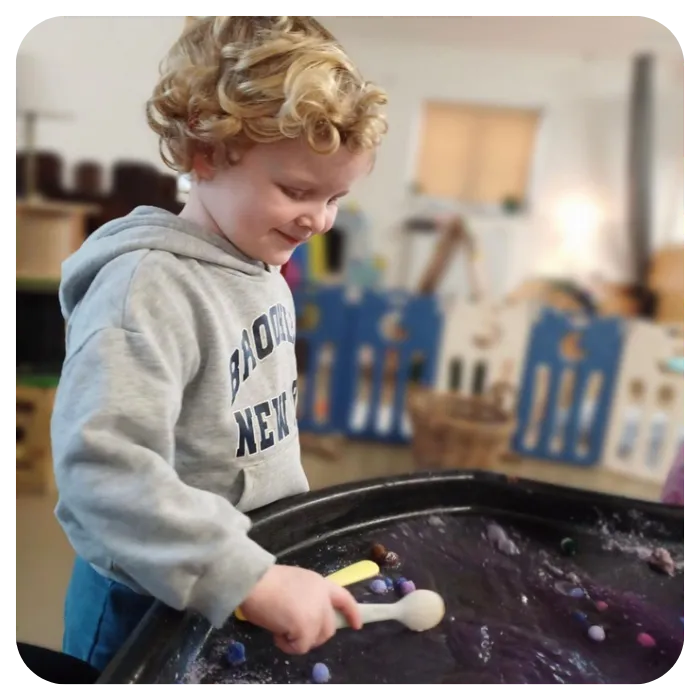 prechool child playing with sensory play