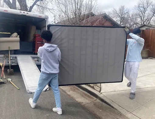 a pile of old suitcases sitting next to each other