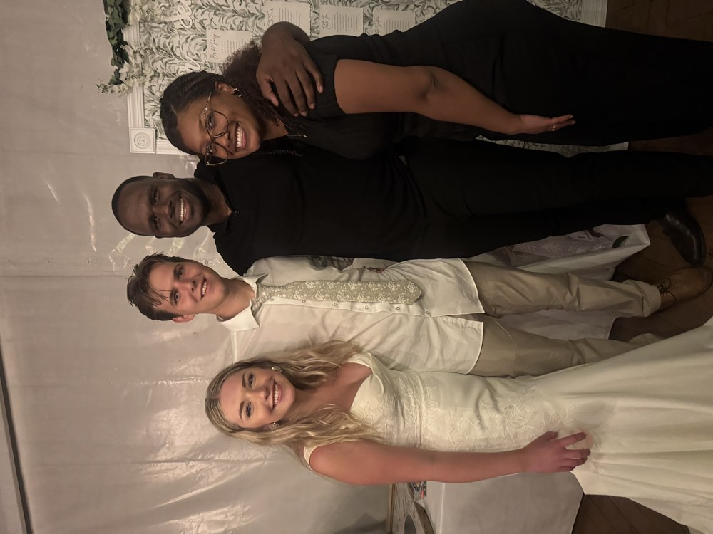David and Mycheal with a couple on their wedding day
