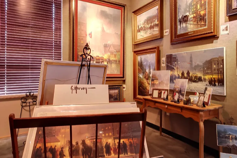 different picture frames on a wall
