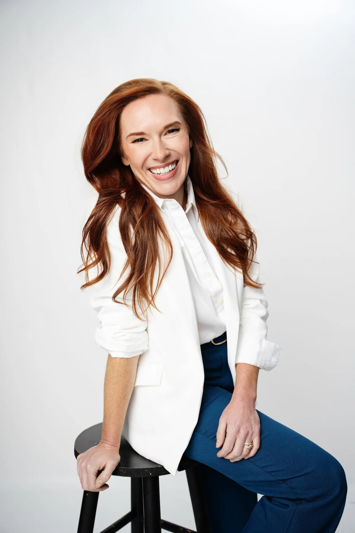 Female entrepreneur captured in a branding photoshoot, portraying strength and leadership in business.