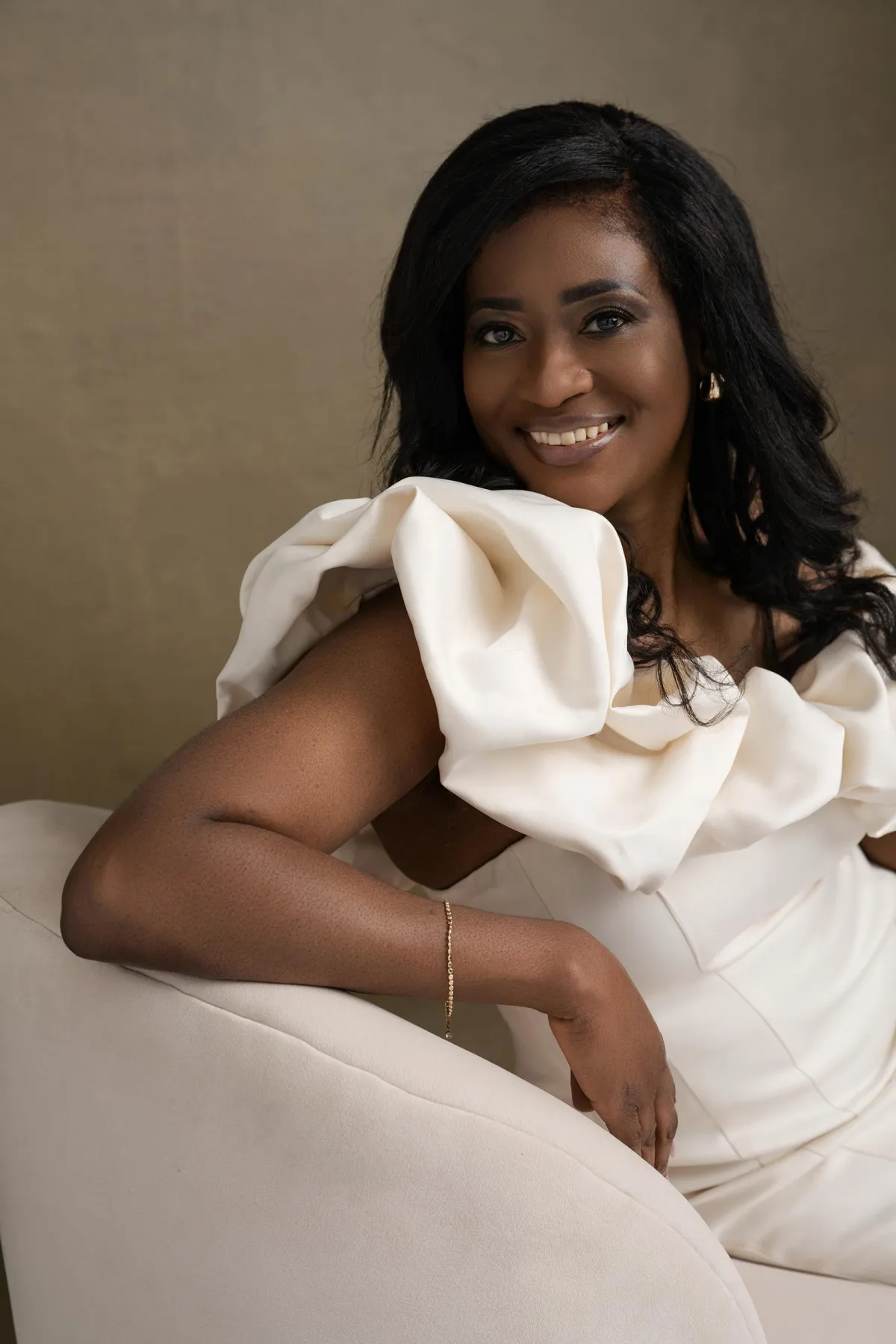 Client in an Empowered Portrait session embracing her unique beauty and feeling confident in front of the camera.