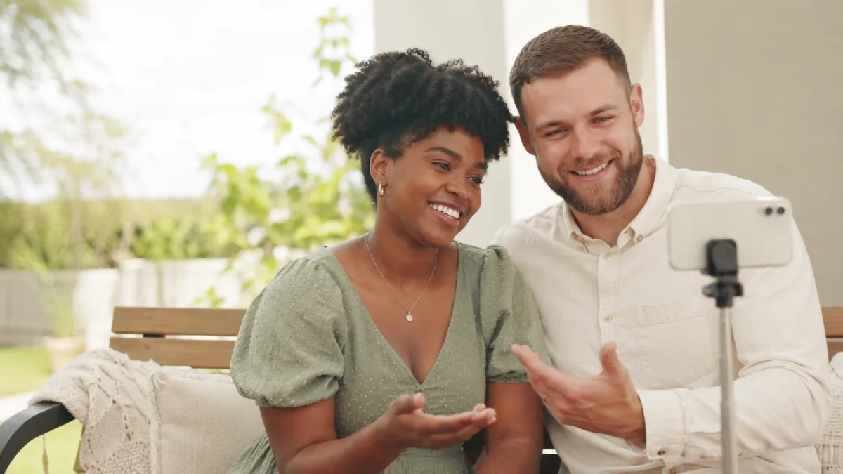 man in black jacket holding spark