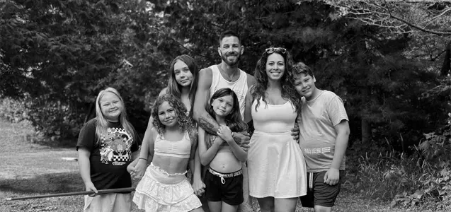 Eric Schroeder, founder of Schroeder Painting LLC, with his wife and five children — a family-owned Minneapolis painting business built on craftsmanship and integrity.