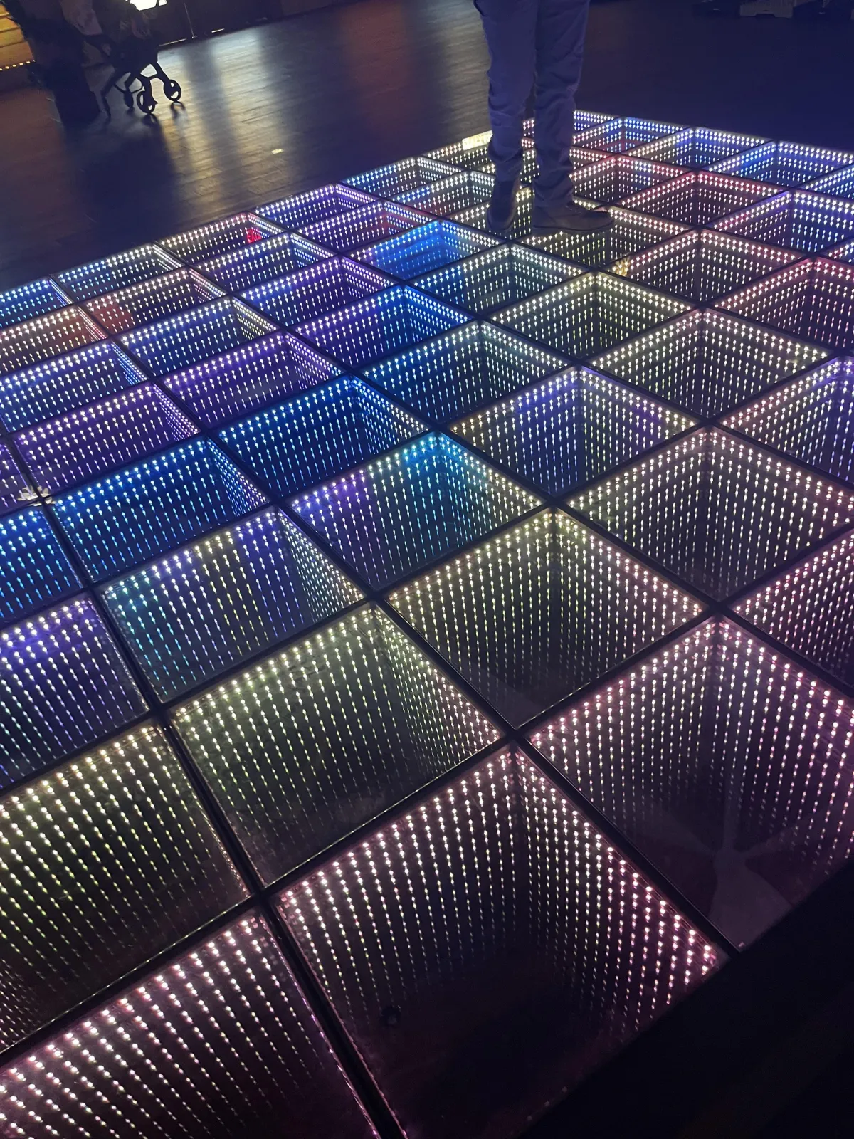 Wedding reception dance floor at The Silo Event Center Tulsa with DJ lighting