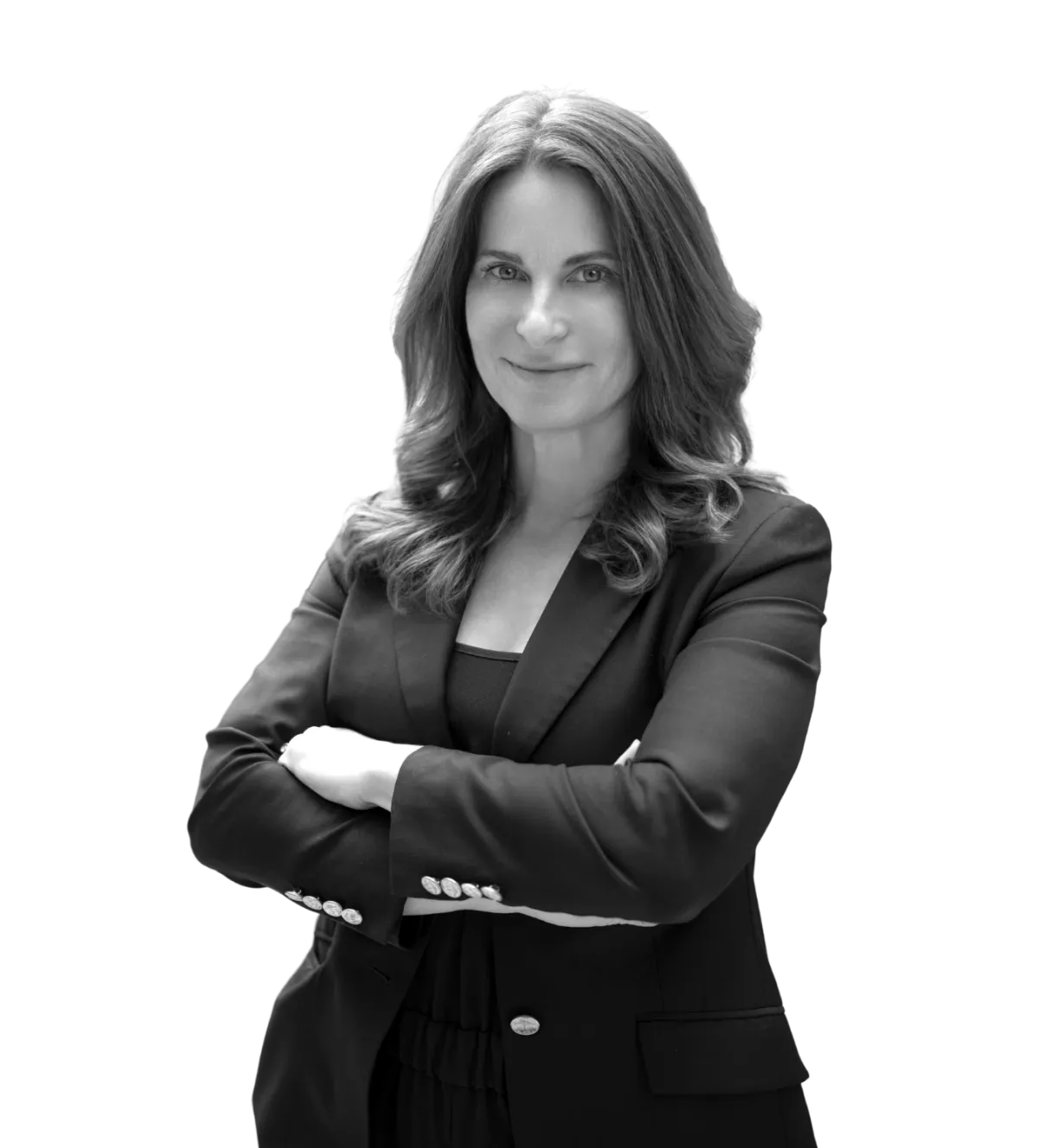 Regina Story fractional CGO standing with arms crossed, image is in black and white