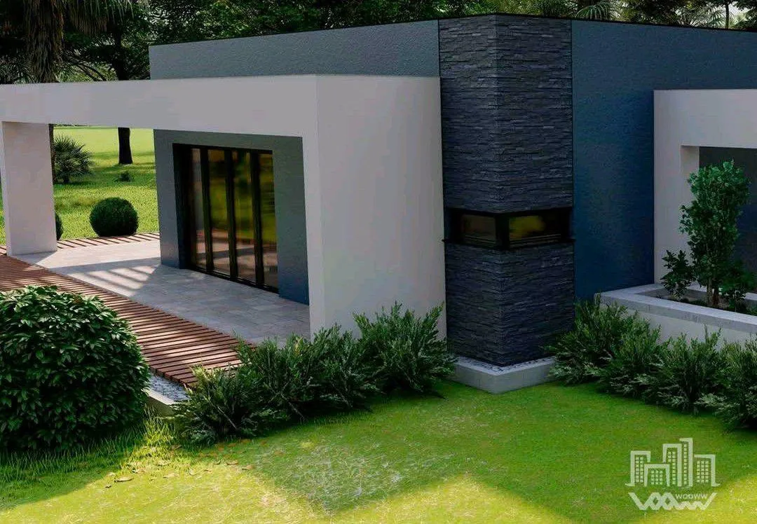 A small house sitting on top of a lush green field