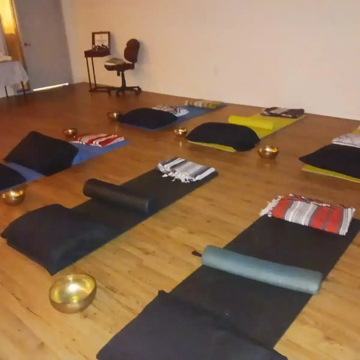 People engaging in a Reiki healing session in a calm environment