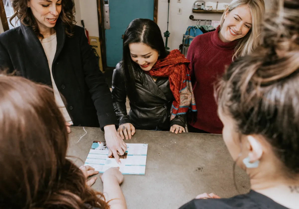 person holding grapes