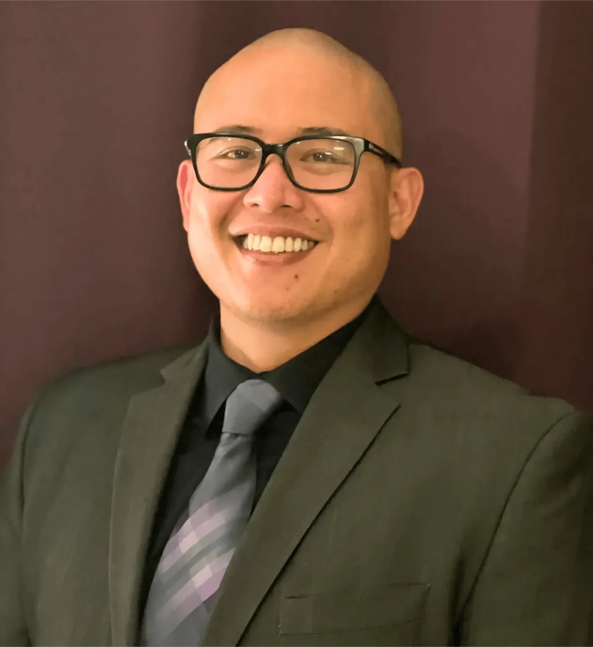 Professional headshot of Dr Lloyd Del Mundo DO board certified pulmonologist and critical care physician at Las Vegas Intensive and Pulmonary Specialists Henderson NV.