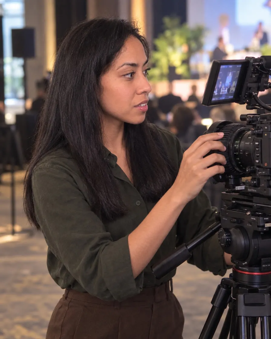 Natalie on set directing a commercial media production with professional camera equipment