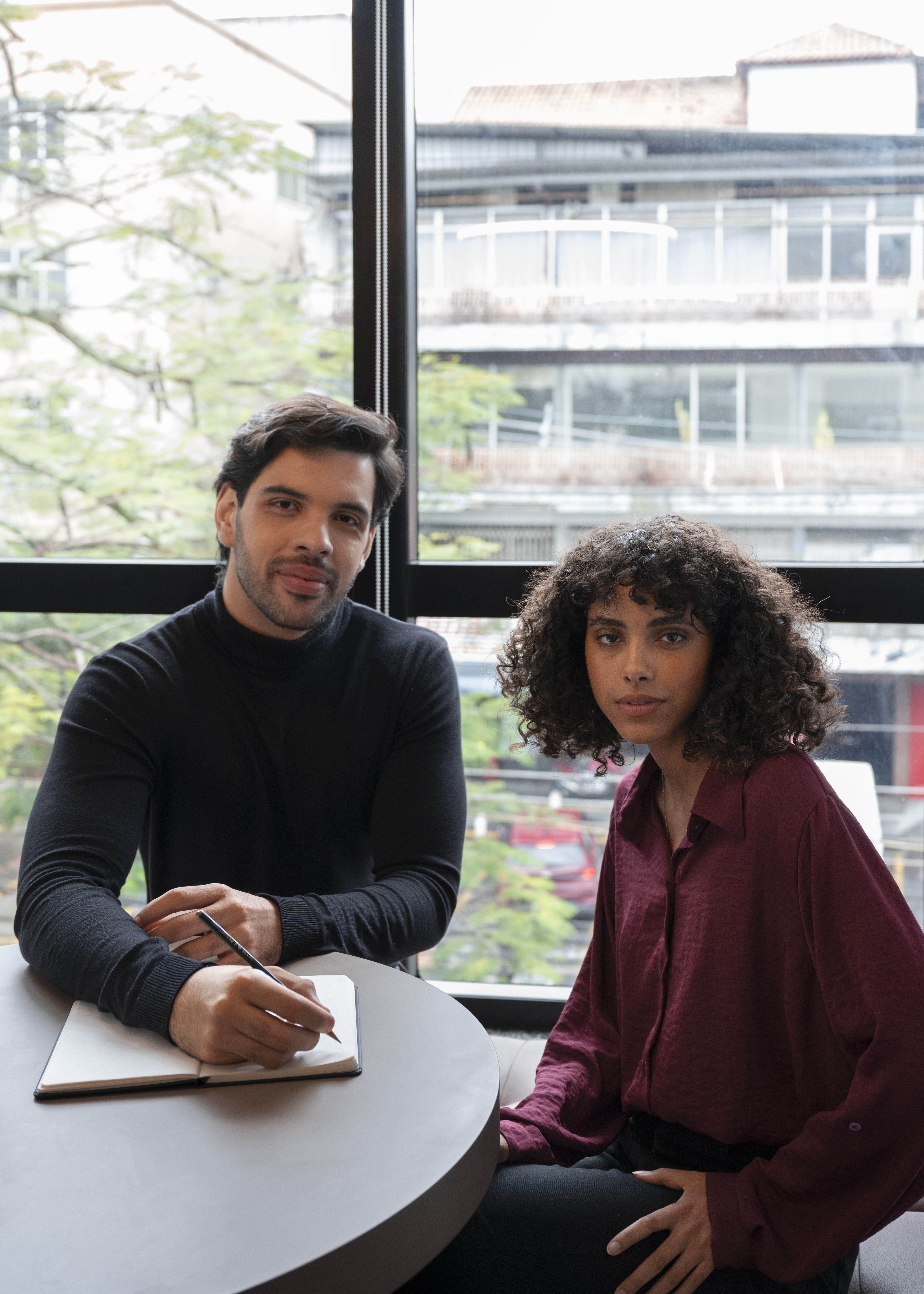 Business leaders in a one on one strategy conversation focused on clarity, growth, and shared outcomes