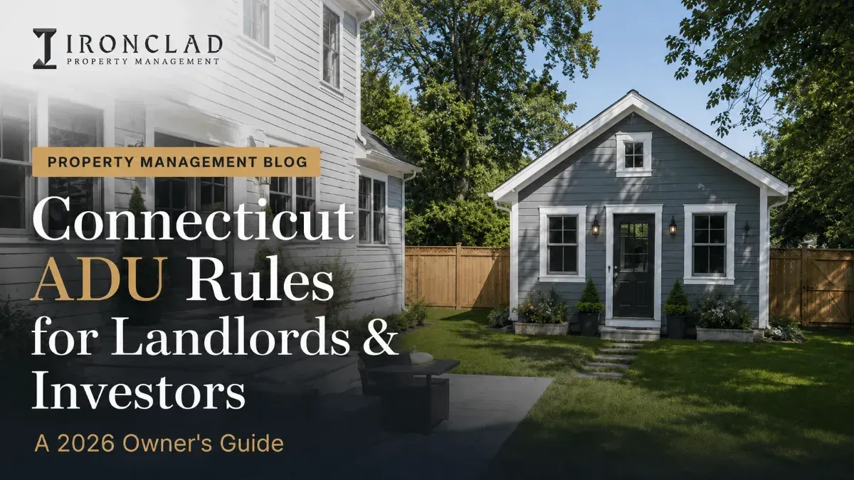 Modern grey accessory dwelling unit (ADU) and main house with a green lawn, representing Connecticut ADU rules for property management and investors.