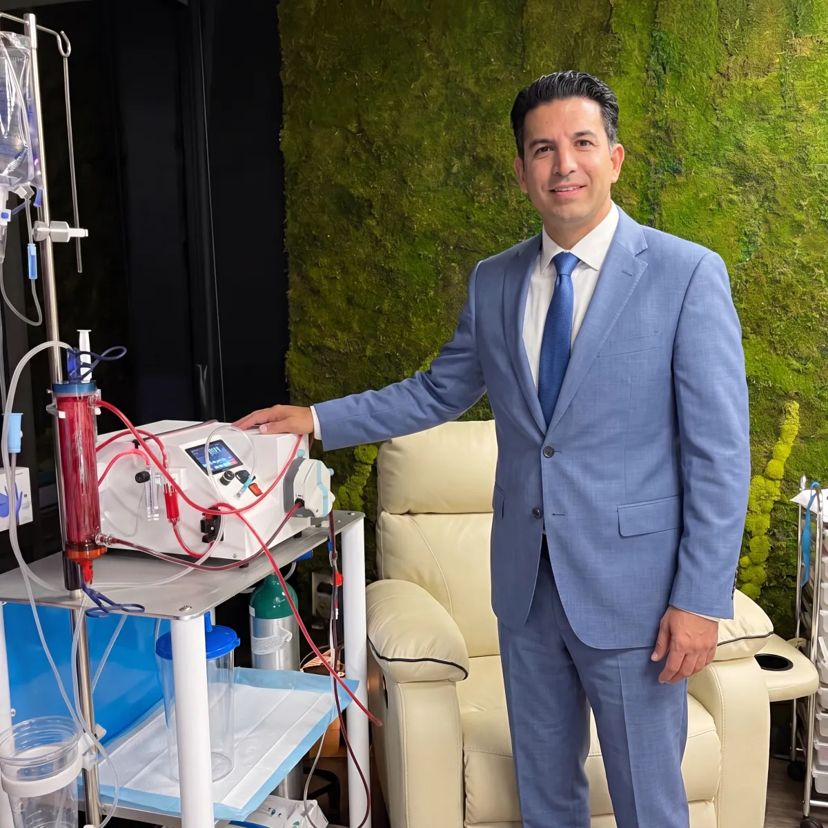 EBOO Ozone Therapy Machine Next To a Sales Man