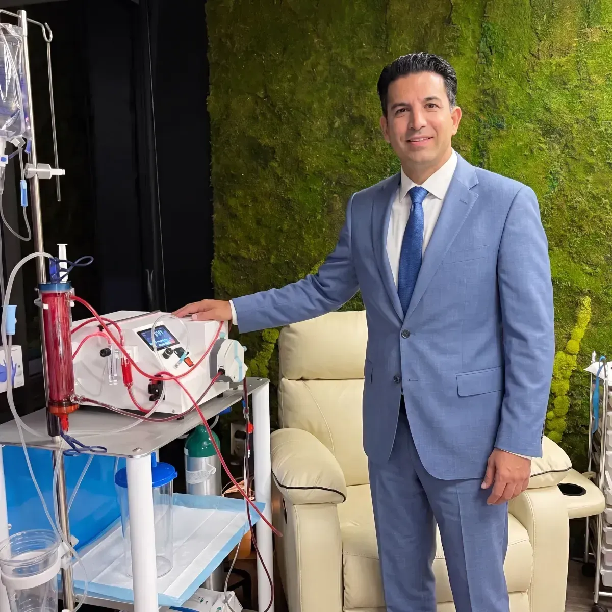 EBOO Ozone Therapy Machine Next To a Sales Man