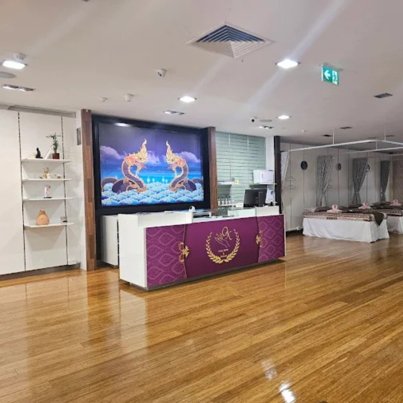 Authentic Thai massage setup with fresh linens and towels