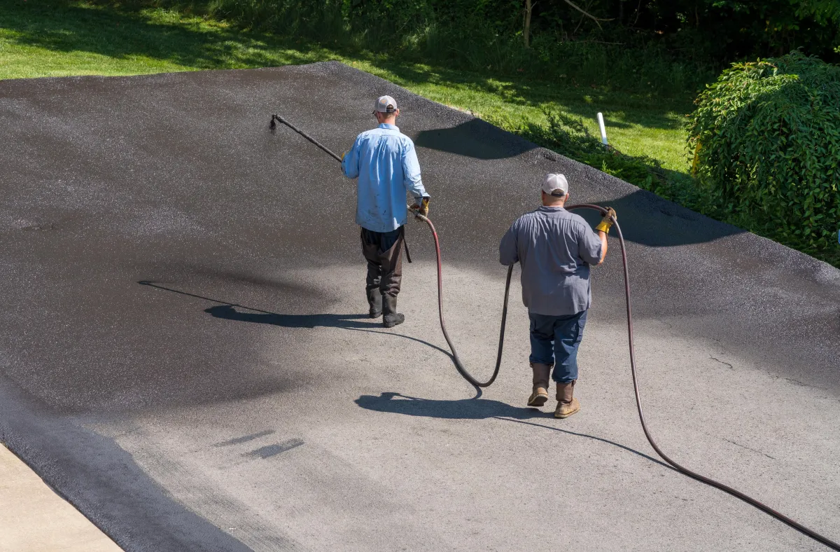 Freshly seal-coated and striped commercial parking lot in Middle Tennessee with smooth black asphalt