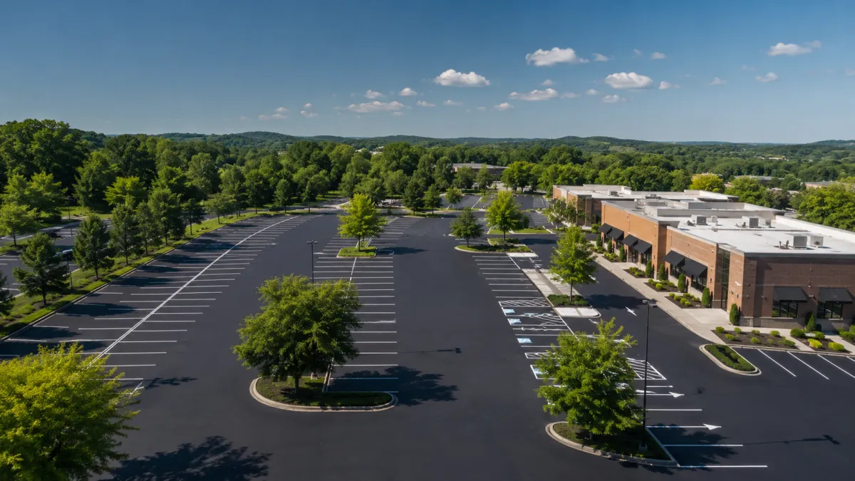Fresh asphalt sealcoating and line striping, commercial parking lot, Spring Hill, TN