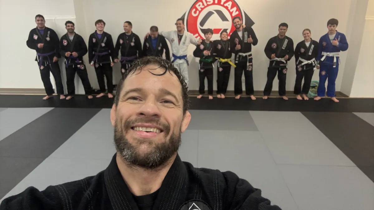 practicing martial arts at Cristyan Brazilian Jiu-Jitsu Academy