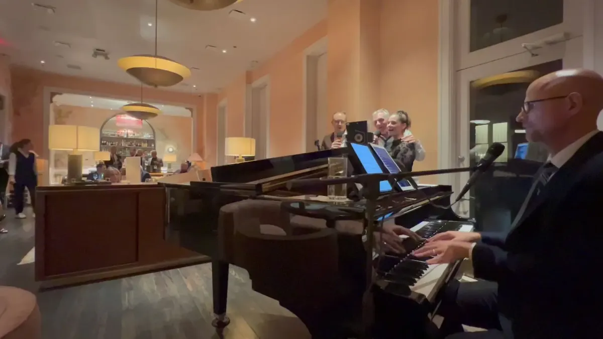 Jeremy Weinglass playing piano for a luncheon at the Beverly Hills Hotel