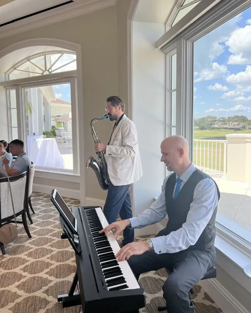 Jeremy Weinglass on keys performing with Corey Peterson on sax at Sawgrass Country Club