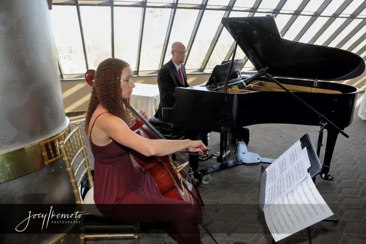 Jeremy Weinglass playing piano with Adrienne Woods on cello for a wedding ceremony at Marina City Club