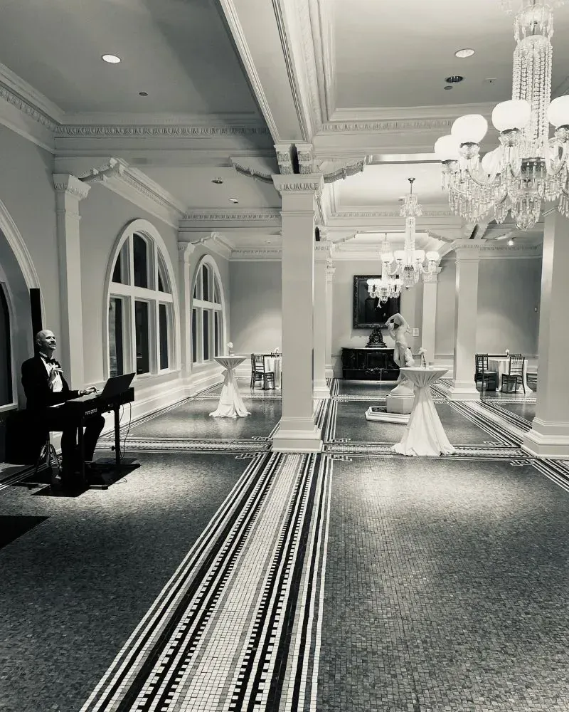 Jeremy Weinglass preparing to perform for cocktail hour at the Lightner Museum in Saint Augustine