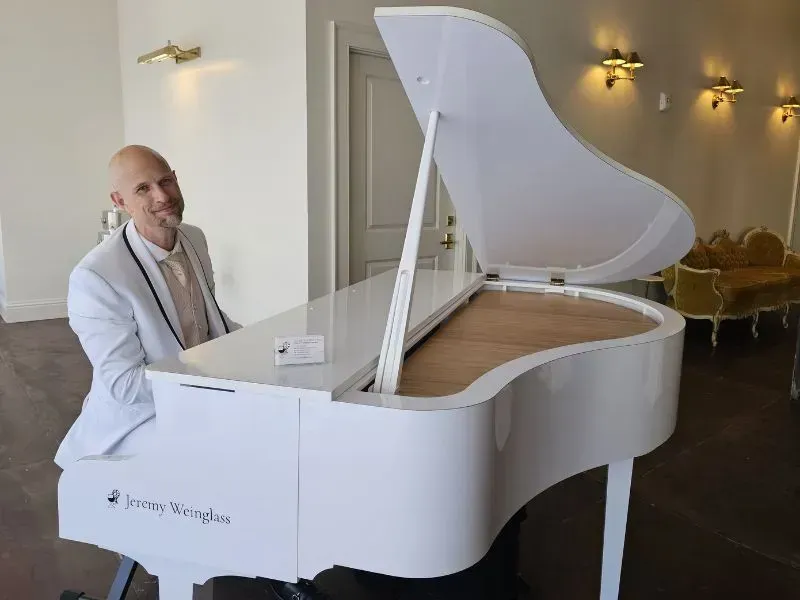 Jeremy Weinglass playing piano at Carondelet House in Los Angeles