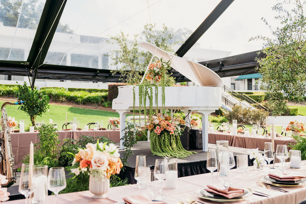 Jeremy Weinglass' white baby grand piano shell make a stunning design centerpiece for a dinner at Timuquana Country Club in Jacksonville, FL