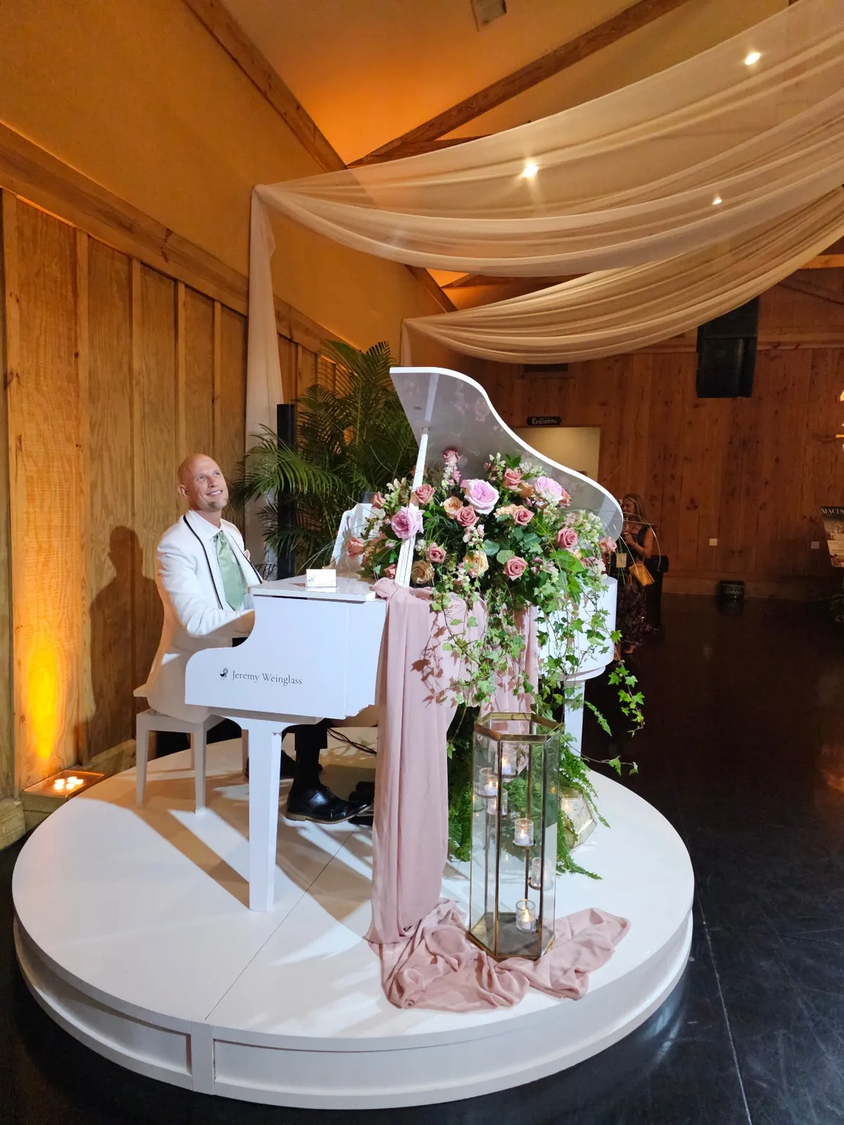 Jeremy Weinglass preparing to play piano for a wedding ceremony at the Ritz Carlton in Amelia Island