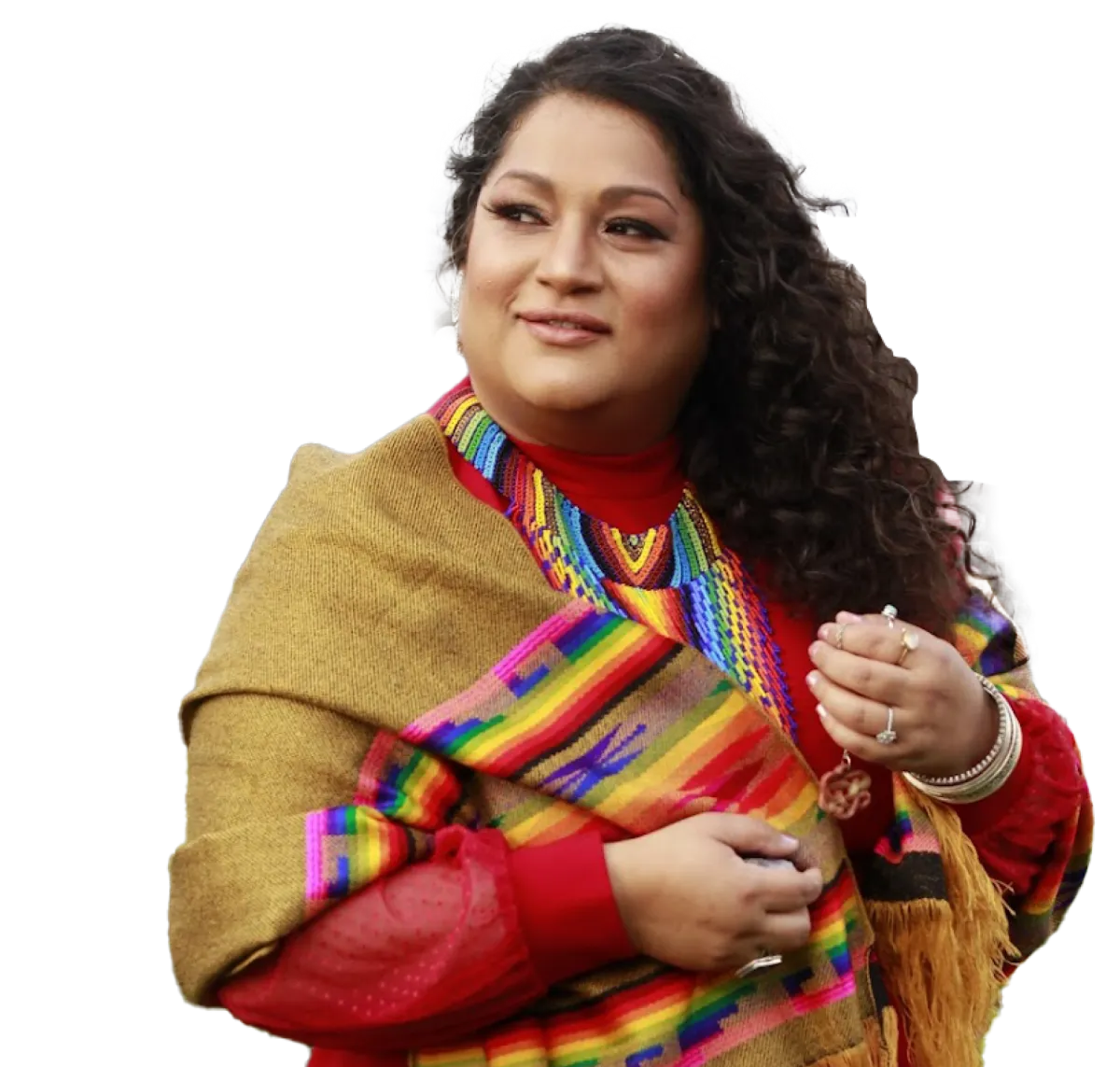 Image of Jikara Starita wearing a colorful wrap or shawl.