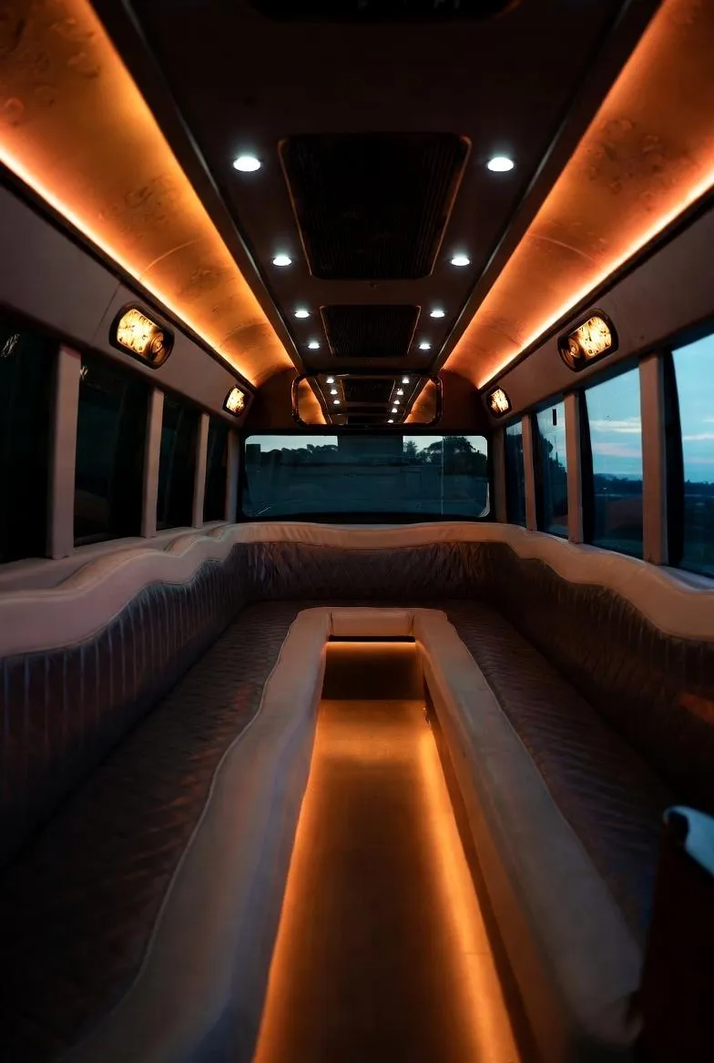 Interior lounge seating with plush wraparound upholstery and warm lighting