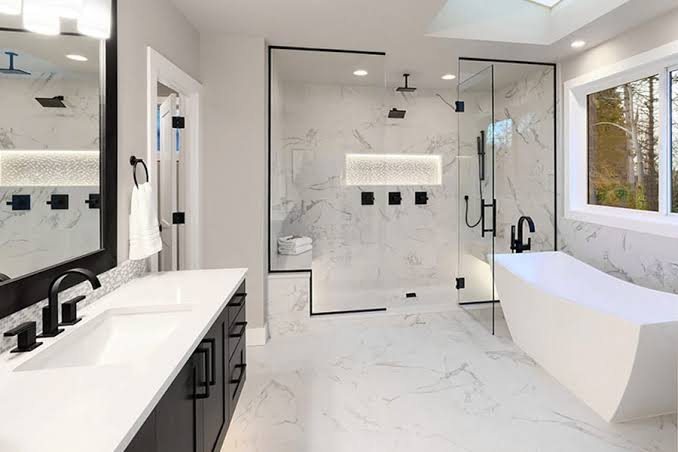 Professional bathroom remodel in Freehold with soaking tub, double vanity, and stylish fixtures