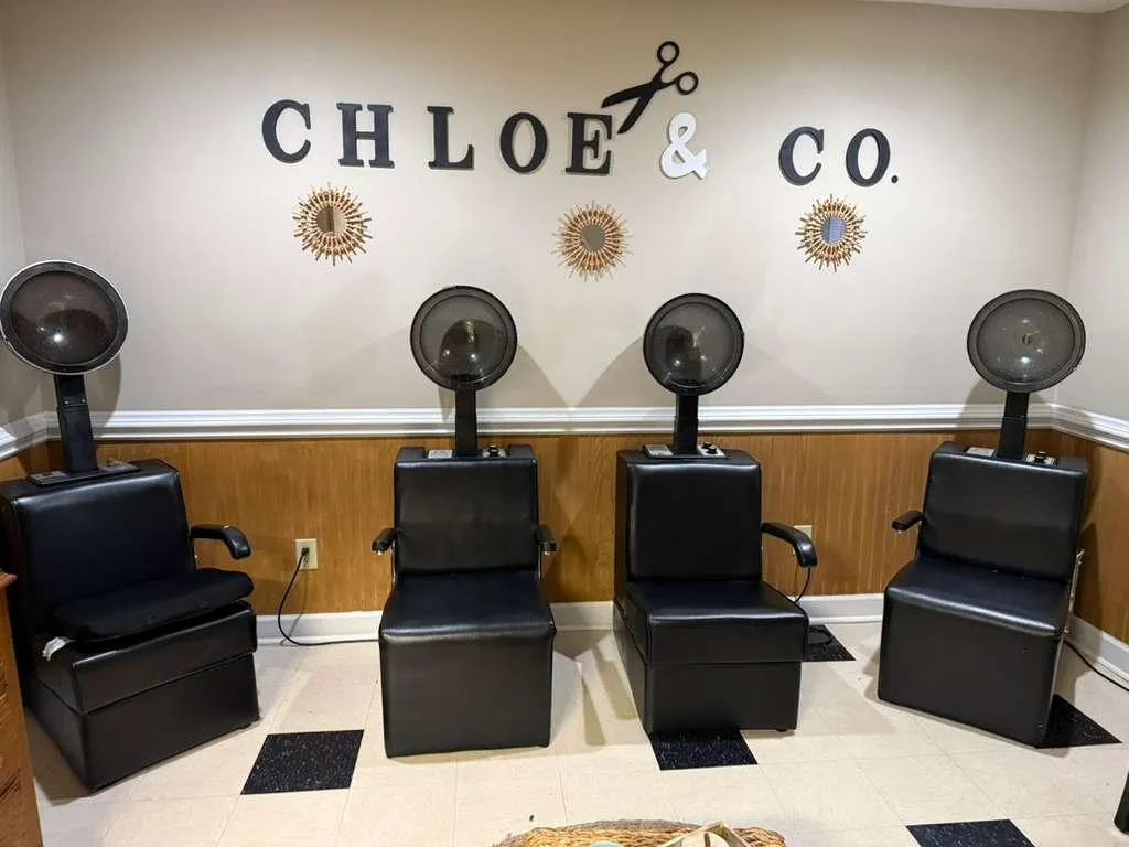 Modern neutral skincare bottle on stone